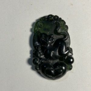Dark green Burma jade pendant